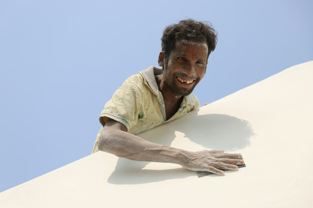 Studio portrait of a Brazilian man with a friendly expression