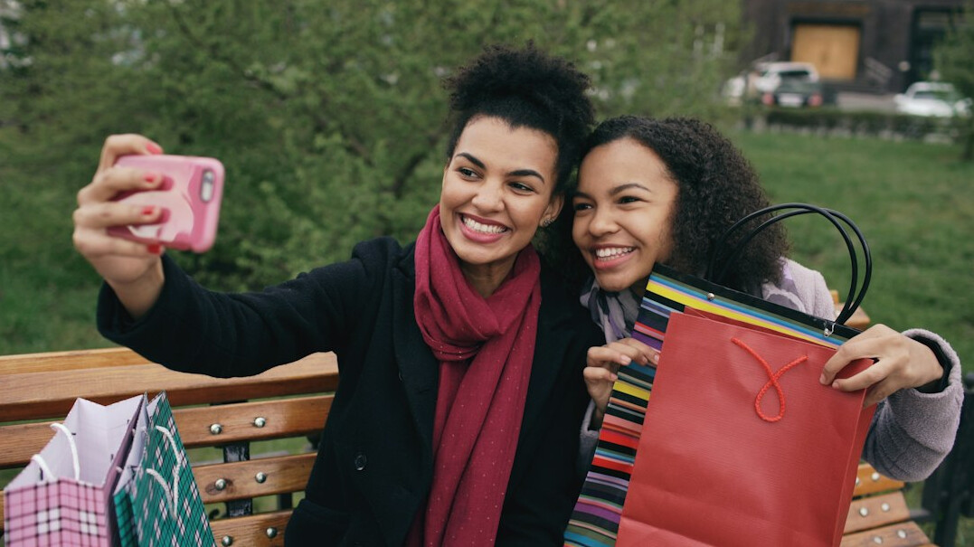 Group of Brazilian people having a warm conversation outdoors