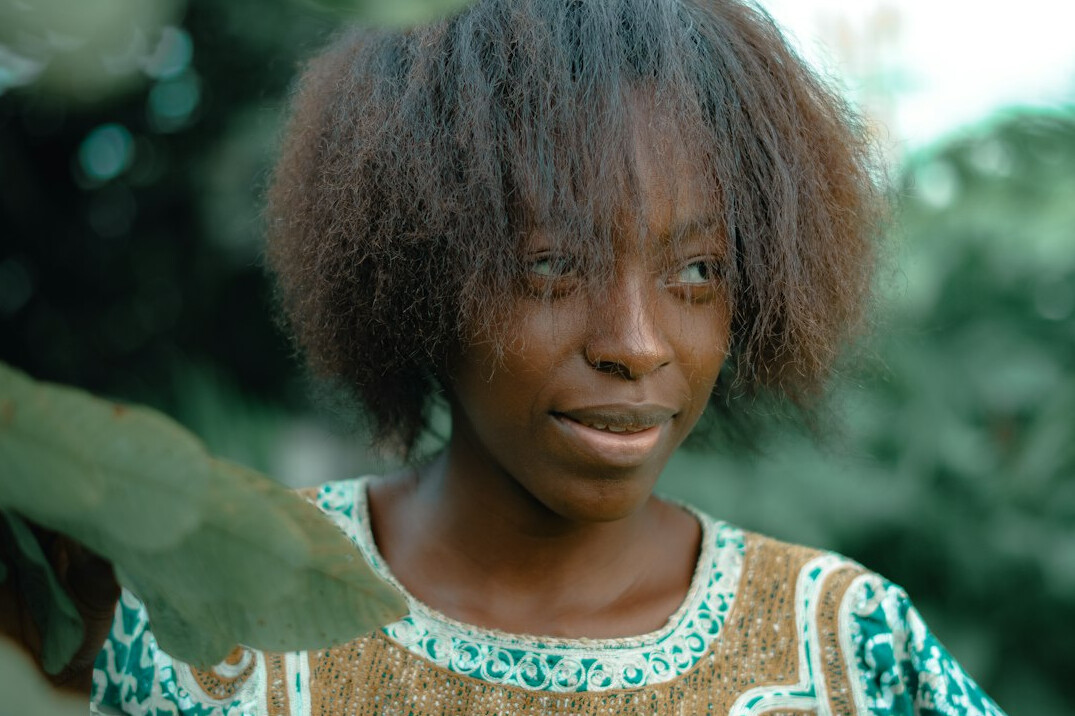 Studio portrait of an Afro-Brazilian woman smiling